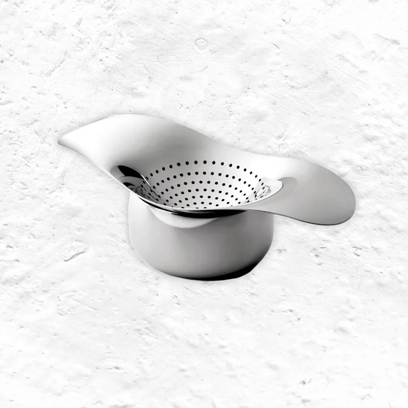 Drift tea strainer & bowl by Robert Welch